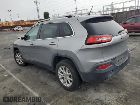 ✅ 2014 Jeep Cherokee Latitude • VIN: 1C4PJLCSXEW319811 • Lot: 85895475. Listed on Copart with 77,242 mi. Free auction sales archive from the USA and detailed vehicle history report at DreamBid. Image 2.