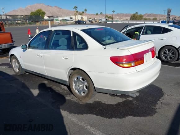 ✅ 2001 Saturn LS • VIN: 1G8JW54R31Y536527 • Lot: 43919359. Listed on IAAI with 99,541 mi. Free auction sales archive from the USA and detailed vehicle history report at DreamBid. Image 3.