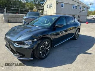 ✅ 2023 Kia EV6 Wind • VIN: KNDC34LA2P5128494 • Lot: 85642905. Wystawiony na Copart z przebiegiem 38 869 mil. Bezpłatny archiwum sprzedaży aukcyjnych z USA i szczegółowy raport historii pojazdu na DreamBid. Zdjęcie 1.