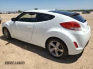 ✅ 2014 Hyundai Veloster • VIN: KMHTC6ADXEU183766 • Lot: 54116795. Wystawiony na Copart z przebiegiem 128 383 mil. Bezpłatny archiwum sprzedaży aukcyjnych z USA i szczegółowy raport historii pojazdu na DreamBid. Zdjęcie 2.