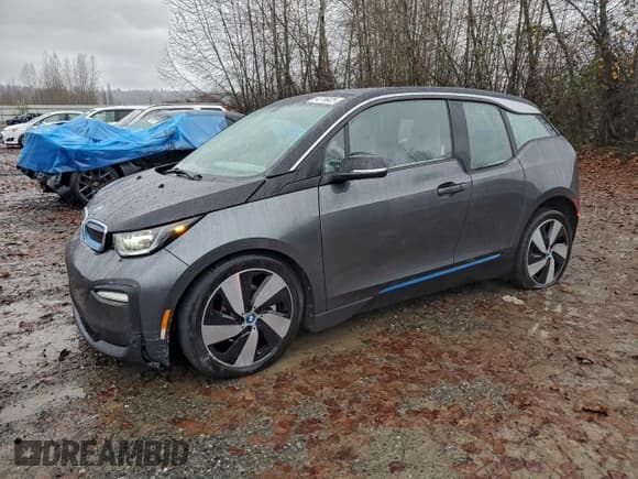 ✅ 2018 BMW i3 • VIN: WBY7Z2C5XJVB88796 • Лот: 94776925. Опубликован ранее на Copart с пробегом 40 211 миль. Бесплатный доступ к архиву аукционных продаж из США и подробный отчёт об истории автомобиля на DreamBid. Изображение 1.