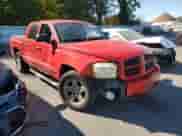 2007 Dodge Dakota SLT z VIN 1D7HW48N57S103881, wystawiony jako Copart lot #75803604 z przebiegiem 194 688 mil mil oraz Szkoda całkowita • Salvage title. Historia ofert i sprzedaży dostępna na DreamBid. Obrazek 4.