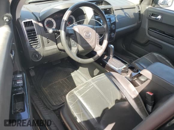 ✅ 2010 Mazda Tribute • VIN: 4F2CY0GG3AKM09527 • Лот: 72778164. Опубликован ранее на Copart с пробегом 156 894 миль. Бесплатный доступ к архиву аукционных продаж из США и подробный отчёт об истории автомобиля на DreamBid. Изображение 8.