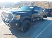 ✅ 2015 GMC Sierra 1500 Denali • VIN: 3GTU2WEJ6FG512222 • Lot: 42728975. Listed on IAAI with 86,679 mi. Free auction sales archive from the USA and detailed vehicle history report at DreamBid. Image 2.