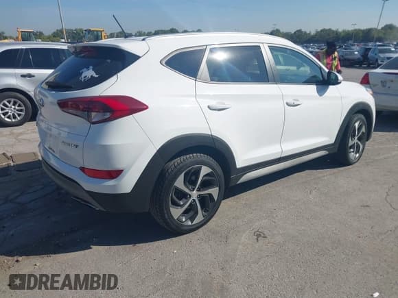 ✅ 2017 Hyundai Tucson Sport • VIN: KM8J33A22HU506975 • Lot: 43233313. Listed on IAAI with 61,552 mi. Free auction sales archive from the USA and detailed vehicle history report at DreamBid. Image 4.