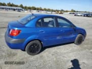 ✅ 2008 Kia Rio LX • VIN: KNADE123086431671 • Lot: 82518655. Listed on Copart with 123,281 mi. Free auction sales archive from the USA and detailed vehicle history report at DreamBid. Image 3.