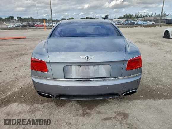 ✅ 2014 Bentley Flying Spur • VIN: SCBEC9ZAXEC088187 • Lot: 95693445. Wystawiony na Copart z przebiegiem 47 445 mil. Bezpłatny archiwum sprzedaży aukcyjnych z USA i szczegółowy raport historii pojazdu na DreamBid. Zdjęcie 6.