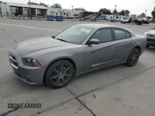 2012 Dodge Charger RT Plus with VIN 2C3CDXCT3CH172740, listed as a Copart auction lot 81868935 with 171,227 mi miles and Clean title. Bid and sale history available at DreamBid. Image 1.