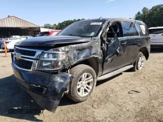2015 Chevrolet Tahoe LS with VIN 1GNSCAEC7FR289043, listed as a Copart auction lot 85112035 with 144,085 mi miles and Salvage title. Bid and sale history available at DreamBid. Image 1.