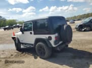 ✅ 2003 Jeep Wrangler Rubicon • VIN: 1J4FA69S73P333199 • Lot: 50602615. Listed on Copart with 133,254 mi. Free auction sales archive from the USA and detailed vehicle history report at DreamBid. Image 2.