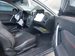 2005 Hyundai Tiburon GT с VIN KMHHN65F35U174645, выставлен на аукционе IAAI как лот 42655120 с пробегом 128 059 миль миль и . История ставок и продаж доступна на DreamBid. Изображение 5.