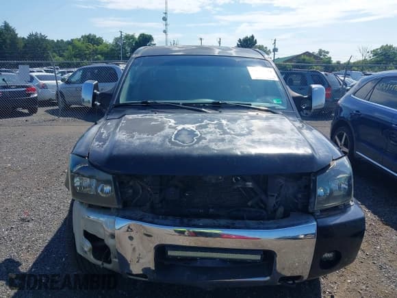 ✅ 2005 Nissan Titan LE • VIN: 1N6AA07B05N509859 • Lot: 42662424. Listed on IAAI with 252,000 mi. Free auction sales archive from the USA and detailed vehicle history report at DreamBid. Image 13.