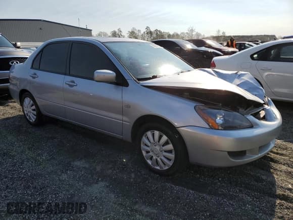 ✅ 2004 Mitsubishi Lancer LS • VIN: JA3AJ36E24U020656 • Lot: 50809275. Listed on Copart with 214,332 mi. Free auction sales archive from the USA and detailed vehicle history report at DreamBid. Image 4.