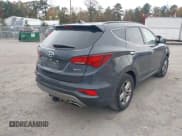 ✅ 2017 Hyundai Santa Fe 2.4L • VIN: 5NMZU3LB6HH027984 • Lot: 43505016. Listed on IAAI with 138,308 mi. Free auction sales archive from the USA and detailed vehicle history report at DreamBid. Image 4.