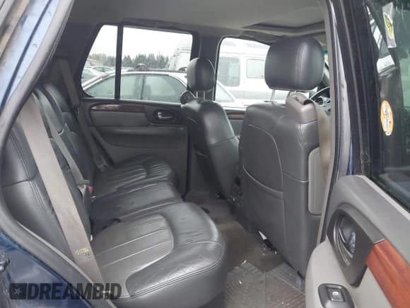 ✅ 2002 GMC Envoy SLT • VIN: 1GKDT13S522247392 • Lot: 43523641. Wystawiony na IAAI z przebiegiem 165 798 mil. Bezpłatny archiwum sprzedaży aukcyjnych z USA i szczegółowy raport historii pojazdu na DreamBid. Zdjęcie 8.