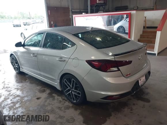 ✅ 2019 Hyundai Elantra Sport • VIN: KMHD04LB0KU887208 • Lot: 42259299. Listed on IAAI with 104,142 mi. Free auction sales archive from the USA and detailed vehicle history report at DreamBid. Image 3.