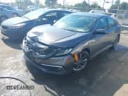 ✅ 2021 Honda Civic EX • VIN: 19XFC1F34ME011217 • Lot: 43251933. Listed on IAAI with 47,511 mi. Free auction sales archive from the USA and detailed vehicle history report at DreamBid. Image 2.