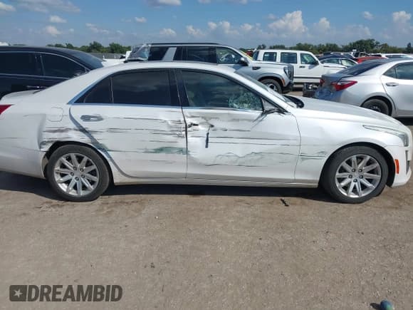 ✅ 2015 Cadillac CTS Luxury RWD • VIN: 1G6AR5SX8F0115314 • Лот: 43388516. Опубликован ранее на IAAI с пробегом 135 303 миль. Бесплатный доступ к архиву аукционных продаж из США и подробный отчёт об истории автомобиля на DreamBid. Изображение 13.