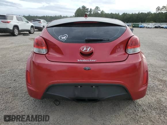 2012 Hyundai Veloster w/Gray Int с VIN KMHTC6AD8CU051215, выставлен на аукционе Copart как лот 70504994 с пробегом 162 522 миль миль и Списание • Salvage title. История ставок и продаж доступна на DreamBid. Изображение 6.