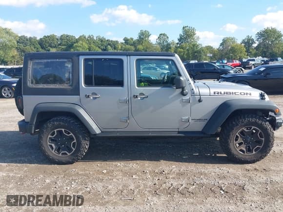 ✅ 2016 Jeep Wrangler Unlimited Rubicon • VIN: 1C4BJWFG4GL145354 • Lot: 43238324. Listed on IAAI with 125,574 mi. Free auction sales archive from the USA and detailed vehicle history report at DreamBid. Image 13.