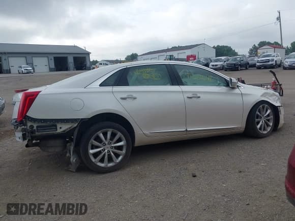 ✅ 2014 Cadillac XTS Luxury • VIN: 2G61N5S31E9134185 • Lot: 42622642. Wystawiony na IAAI z przebiegiem 147 410 mil. Bezpłatny archiwum sprzedaży aukcyjnych z USA i szczegółowy raport historii pojazdu na DreamBid. Zdjęcie 13.