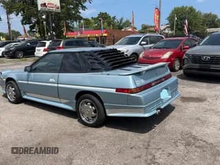 ✅ 1989 Subaru XT • VIN: JF1AX4320KB300087 • Лот: 68333195. Опубликован ранее на Copart с пробегом 125 306 миль. Бесплатный доступ к архиву аукционных продаж из США и подробный отчёт об истории автомобиля на DreamBid. Изображение 3.