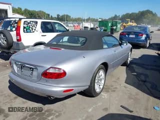 ✅ 2001 Jaguar XK • VIN: SAJDA42C91NA18938 • Lot: 43357157. Wystawiony na IAAI z przebiegiem 59 683 mil. Bezpłatny archiwum sprzedaży aukcyjnych z USA i szczegółowy raport historii pojazdu na DreamBid. Zdjęcie 4.