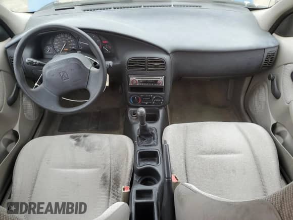 2002 Saturn SL z VIN 1G8ZF52872Z183427, wystawiony jako Copart lot #42719665 z przebiegiem 154 393 mil mil oraz Szkoda całkowita • Salvage title. Historia ofert i sprzedaży dostępna na DreamBid. Obrazek 8.