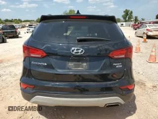 ✅ 2018 Hyundai Santa Fe 2.4L • VIN: 5XYZUDLB7JG537962 • Лот: 65400323. Опубликован ранее на Copart с пробегом 66 859 миль. Бесплатный доступ к архиву аукционных продаж из США и подробный отчёт об истории автомобиля на DreamBid. Изображение 6.