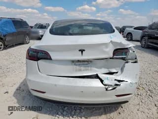 ✅ 2021 Tesla Model 3 Standard Range Plus • VIN: 5YJ3E1EA7MF867313 • Лот: 84810585. Опубликован ранее на Copart с пробегом 53 379 миль. Бесплатный доступ к архиву аукционных продаж из США и подробный отчёт об истории автомобиля на DreamBid. Изображение 6.