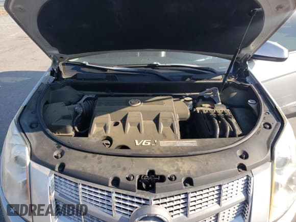 ✅ 2012 Cadillac SRX • VIN: 3GYFNGE3XCS530359 • Лот: 71476715. Опубликован ранее на Copart с пробегом 110 214 миль. Бесплатный доступ к архиву аукционных продаж из США и подробный отчёт об истории автомобиля на DreamBid. Изображение 12.