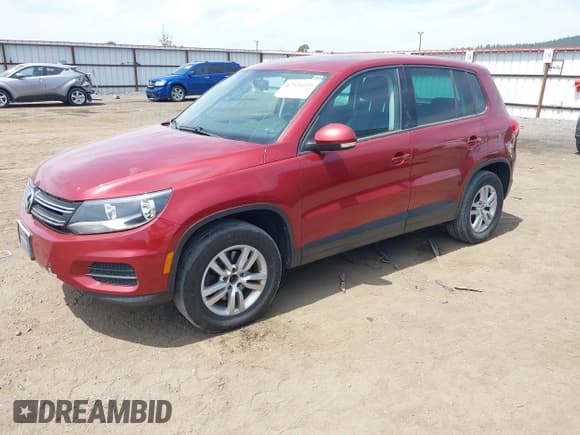 ✅ 2012 Volkswagen Tiguan LE • VIN: WVGAV7AX5CW097459 • Lot: 42526659. Listed on IAAI with 158,634 mi. Free auction sales archive from the USA and detailed vehicle history report at DreamBid. Image 2.
