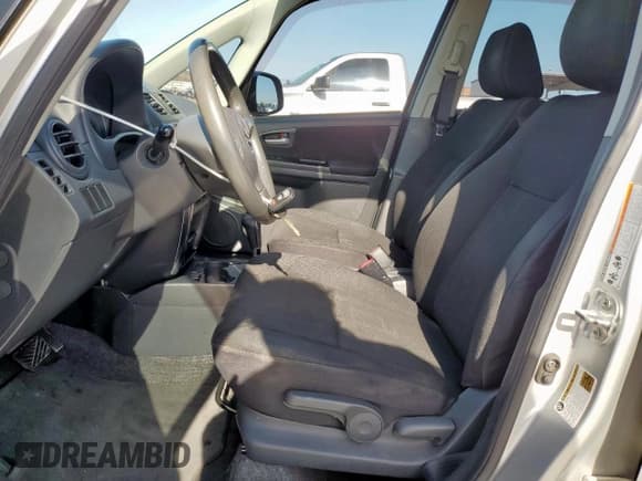 ✅ 2010 Suzuki SX4 • VIN: JS2YA5A31A6301175 • Lot: 65489335. Wystawiony na Copart z przebiegiem 151 986 mil. Bezpłatny archiwum sprzedaży aukcyjnych z USA i szczegółowy raport historii pojazdu na DreamBid. Zdjęcie 7.