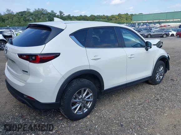 ✅ 2023 Mazda CX-5 S Carbon Edition • VIN: JM3KFBCM3P0271198 • Lot: 43280639. Listed on IAAI with 9,481 mi. Free auction sales archive from the USA and detailed vehicle history report at DreamBid. Image 4.