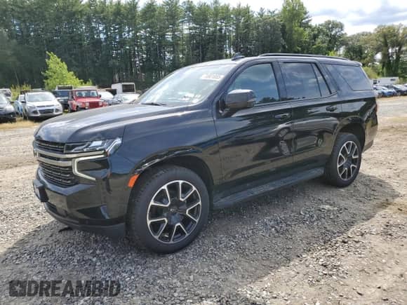 2022 Chevrolet Tahoe RST with VIN 1GNSKRKD0NR244846, listed as a Copart auction lot 70801855 with 69,403 mi miles and Salvage title. Bid and sale history available at DreamBid. Image 1.