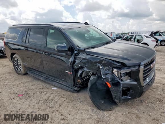 ✅ 2021 GMC Yukon XL AT4 • VIN: 1GKS2HKD6MR398256 • Lot: 63191635. Listed on Copart with 64,102 mi. Free auction sales archive from the USA and detailed vehicle history report at DreamBid. Image 4.