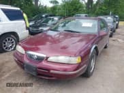 ✅ 1997 Mercury Cougar XR7 • VIN: 1MELM62W7VH617134 • Лот: 42536724. Опубликован ранее на IAAI с пробегом 145 849 миль. Бесплатный доступ к архиву аукционных продаж из США и подробный отчёт об истории автомобиля на DreamBid. Изображение 2.