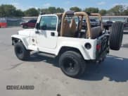 ✅ 1998 Jeep Wrangler Sahara • VIN: 1J4FY49S8WP750416 • Lot: 43321610. Listed on IAAI with 169,921 mi. Free auction sales archive from the USA and detailed vehicle history report at DreamBid. Image 3.