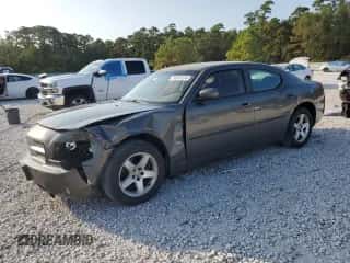 2010 Dodge Charger SXT с VIN 2B3CA3CV4AH202406, выставлен на аукционе Copart как лот 74079124 с пробегом 269 939 миль миль и Списание • Salvage title. История ставок и продаж доступна на DreamBid. Изображение 1.