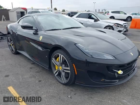 ✅ 2019 Ferrari Portofino • VIN: ZFF89FPAXK0241773 • Lot: 42598682. Listed on IAAI with 9,330 mi. Free auction sales archive from the USA and detailed vehicle history report at DreamBid. Image 1.