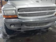 ✅ 2004 Dodge Dakota SLT • VIN: 1D7HG48N64S523528 • Lot: 41199575. Wystawiony na IAAI z przebiegiem 261 239 mil. Bezpłatny archiwum sprzedaży aukcyjnych z USA i szczegółowy raport historii pojazdu na DreamBid. Zdjęcie 17.