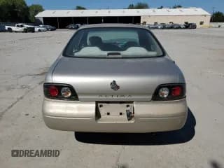 ✅ 1997 Nissan Altima XE • VIN: 1N4BU31D2VC268883 • Lot: 76528444. Listed on Copart with 138,146 mi. Free auction sales archive from the USA and detailed vehicle history report at DreamBid. Image 6.