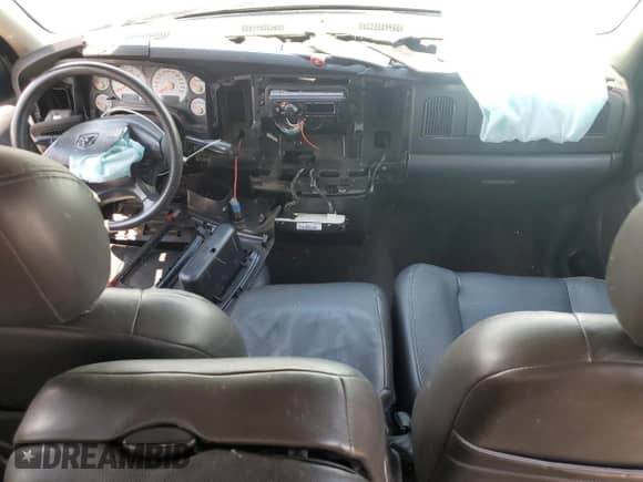 2003 Dodge 1500 ST z VIN 1D7HA18D93S365109, wystawiony jako Copart lot #69326694 z przebiegiem 229 839 mil mil oraz Szkoda całkowita • Salvage title. Historia ofert i sprzedaży dostępna na DreamBid. Obrazek 8.