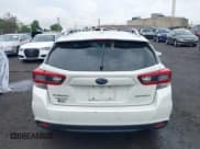 ✅ 2022 Subaru Impreza Premium • VIN: 4S3GTAV61N3714721 • Lot: 42642070. Listed on IAAI with 19,818 mi. Free auction sales archive from the USA and detailed vehicle history report at DreamBid. Image 16.