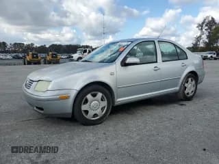 ✅ 2004 Volkswagen Jetta GL • VIN: 3VWRK69M44M108972 • Lot: 90127115. Listed on Copart with 102,296 mi. Free auction sales archive from the USA and detailed vehicle history report at DreamBid. Image 1.