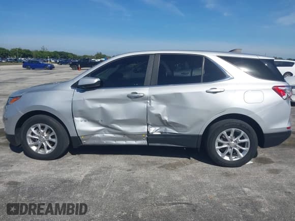 ✅ 2021 Chevrolet Equinox LT • VIN: 2GNAXKEV4M6102860 • Lot: 43678274. Listed on IAAI with 92,118 mi. Free auction sales archive from the USA and detailed vehicle history report at DreamBid. Image 14.