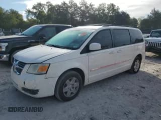 ✅ 2009 Dodge Grand Caravan SXT • VIN: 2D8HN54X79R605727 • Лот: 70281905. Опубликован ранее на Copart с пробегом 160 361 миль. Бесплатный доступ к архиву аукционных продаж из США и подробный отчёт об истории автомобиля на DreamBid. Изображение 1.