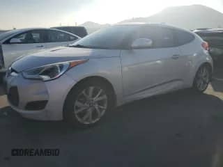 2016 Hyundai Veloster z VIN KMHTC6AD3GU285879, wystawiony jako Copart lot #83214224 z przebiegiem 149 808 mil mil oraz Czysty tytuł • Clean title. Historia ofert i sprzedaży dostępna na DreamBid. Obrazek 1.