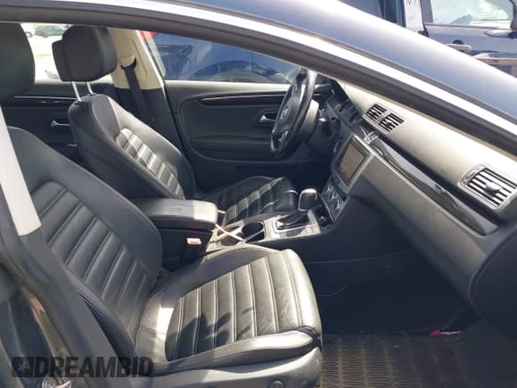 ✅ 2014 Volkswagen CC Executive • VIN: WVWRP7AN7EE501483 • Lot: 42090985. Listed on IAAI with 121,737 mi. Free auction sales archive from the USA and detailed vehicle history report at DreamBid. Image 5.