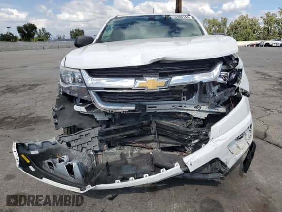 2019 Chevrolet Colorado 2WD Work Truck с VIN 1GCHSBEN2K1269370, выставлен на аукционе Copart как лот 56996145 с пробегом 59 198 миль миль и Списание • Salvage title. История ставок и продаж доступна на DreamBid. Изображение 5.